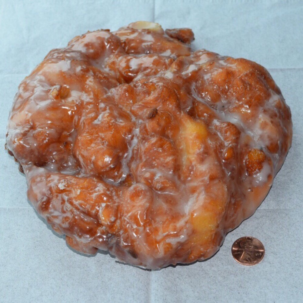 Wake N Bake Donuts - Peach Fritter (the penny still doesn't do justice to show how huge it is): Wake-n-Bake Doughnuts - Donuts Near Me - Carolina Beach, North Carolina Wake N Bake Donuts - Peach Fritter (the penny still doesn't do justice to show how huge it is): Wake-n-Bake Doughnuts - Donuts Near Me - Carolina Beach, North Carolina