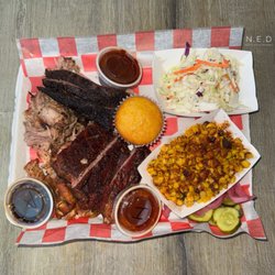 Twisted Street BBQ - Pit Master Platter (Brisket, Pulled Chicken, Pulled Pork, and Ribs) with BBQ Street Corn, Cole Slaw, and Sweet Honey Cornbread