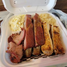 3 meat combo tri tip, chicken, ribs. 2 sides pilaf/potatoe salad. Incredible!