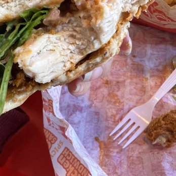 Jollibee - Cross section of the Spicy Chicken Sandwich Deluxe - Chicken Shop Near Me - San Antonio, Texas Jollibee - Cross section of the Spicy Chicken Sandwich Deluxe - Chicken Shop Near Me - San Antonio, Texas