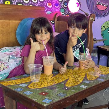 Ripple & Rose Cafe - Happy Kids with their smoothies - Breakfast & Brunch Near Me - Taylor, Texas