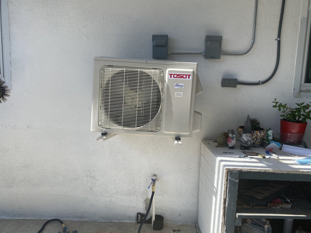Slide of Erin Sons Electric