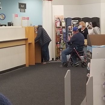 CVS Pharmacy - a man in a wheelchair and a woman in a wheelchair - Drugstores Near Me - Tustin, California CVS Pharmacy - a man in a wheelchair and a woman in a wheelchair - Drugstores Near Me - Tustin, California