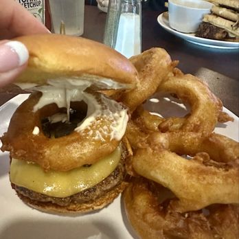 Bohemian Bull - Truffle Burger with side of Onion Rings - American Near Me - Grapevine, Texas Bohemian Bull - Truffle Burger with side of Onion Rings - American Near Me - Grapevine, Texas