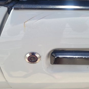 631 Auto Body - passenger door now has massive blister and rust due to poor prep. Go back to the pic showing how much bondo is underneath this blister. - Body Shops Near Me - Copiague, New York