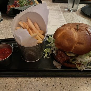 The Standard - Spicy chicken burger with fries! - Lounges Near Me - Fresno, California The Standard - Spicy chicken burger with fries! - Lounges Near Me - Fresno, California