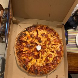Supposed to be an extra large pepperoni pizza. Instead it was a charred, burnt disc. Supposed to be an extra large pepperoni pizza. Instead it was a charred, burnt disc.