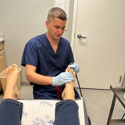 Belmont Anderson & Associates - Dr. Anderson performing shockwave therapy to my foot. Not painful at all.