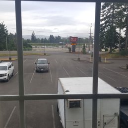 View from our window. This the entrance and parking lot of hotel. Burger king is located a block away