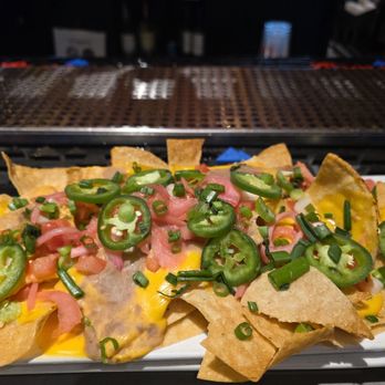Rangers Republic - Happy hour loaded nachos - Salad Near Me - Arlington, Texas Rangers Republic - Happy hour loaded nachos - Salad Near Me - Arlington, Texas