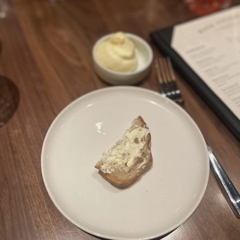 Bask Steakhouse - Bread service- sourdough bread with butter - Steakhouses Near Me - Roswell, Georgia