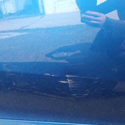 Rick's Auto Body Shop - Pretty deep scratch and indent in the metal