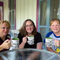 Manor Bed & Breakfast Inn - Enjoying coffee on the front porch