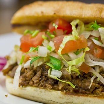 Tacos San Buena - a taco sandwich on a plate - Mexican Near Me - San Francisco, California Tacos San Buena - a taco sandwich on a plate - Mexican Near Me - San Francisco, California