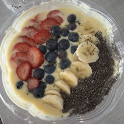SunShine Nutrition - Mango bowl with fruit toppings and chia seeds