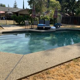 Pool prior to resurfacing (with water) Pool prior to resurfacing (with water)