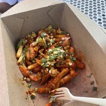 Elephant Wings - Tikka Masala Poutine - Indian Near Me - Kansas City, Missouri Elephant Wings - Tikka Masala Poutine - Indian Near Me - Kansas City, Missouri