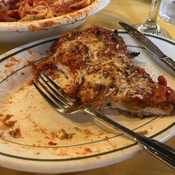 DeNatale’s - The after shot of the ginormous chicken parmigiana.