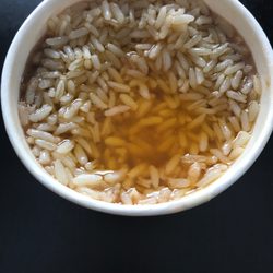 Popeyes Louisiana Kitchen - Rice and beans flooded in oil.