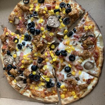 MOD Pizza - Tasty spicy sausage, bacon, mushroom, olive and corn pizza - Fast Food Near Me - San Jose, California