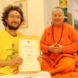 Joyful Spirit Yoga - Receiving diploma from Swami Sitaramananda at the Sivananda Yoga Farm