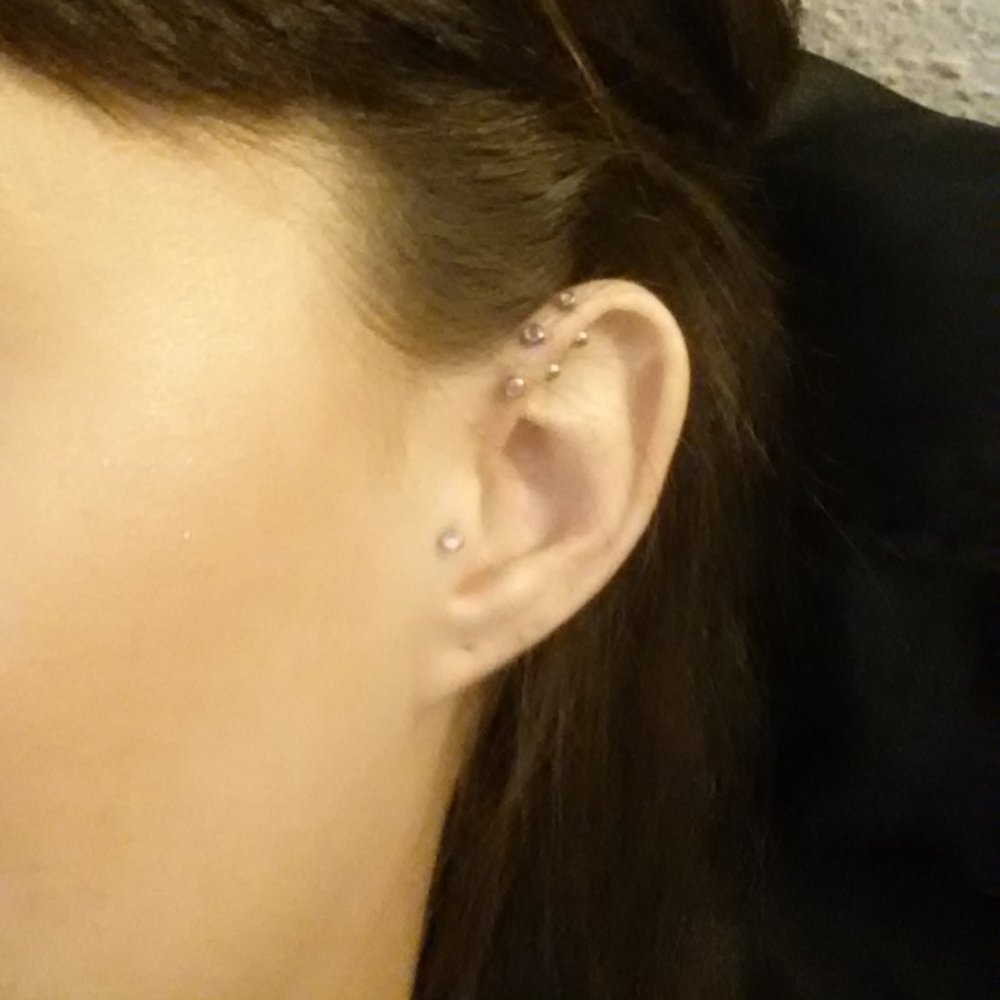 Fallen Angel Tattoo - My complicated helix Piercings that Carrie did today! - Tattoo Near Me - Roseville, California