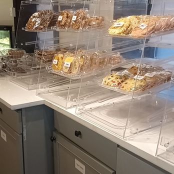 Manoa Bakery Cafe - Display case.  We'll labeled treats. - Coffee & Tea Near Me - Annandale, Virginia