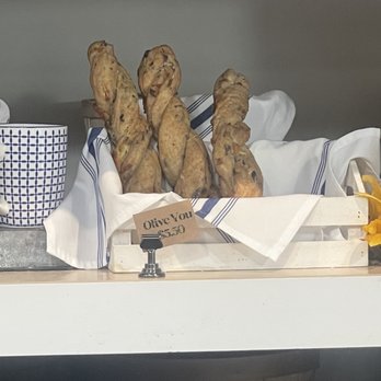 COLAB Kitchen - Mini olive loafs in market - New American Near Me - Stuart, Florida
