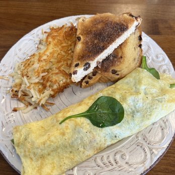 Huntley's Place - Grilled chicken, spinach, and swiss cheese omelet with raisin bread toast and hashbrowns - Breakfast & Brunch Near Me - Virginia Beach, Virginia Huntley's Place - Grilled chicken, spinach, and swiss cheese omelet with raisin bread toast and hashbrowns - Breakfast & Brunch Near Me - Virginia Beach, Virginia