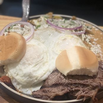 Vecindad de Seattle - Divorciados it's a two different salsa chilaquiles with eggs and Carne. Wow! - Mexican Near Me - Tacoma, Washington Vecindad de Seattle - Divorciados it's a two different salsa chilaquiles with eggs and Carne. Wow! - Mexican Near Me - Tacoma, Washington