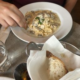 Fresh fettuccine with mushrooms, cream and truffle oil. Fresh fettuccine with mushrooms, cream and truffle oil.