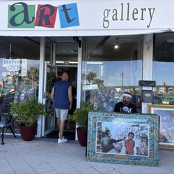 Aberrant Art Gallery - Piano man during a wine walk