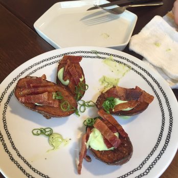Archie's Tap & Table - Potato skin app special. Crispy skins with avocado purée and crispy bacon yum - New American Near Me - Bronx, New York Archie's Tap & Table - Potato skin app special. Crispy skins with avocado purée and crispy bacon yum - New American Near Me - Bronx, New York