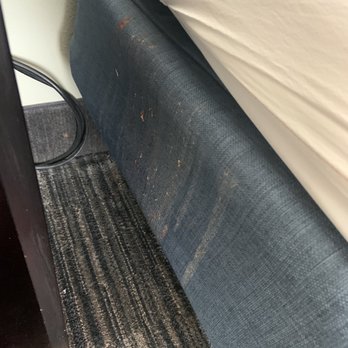 Hampton Inn Pecos - I have no idea what this is on the side of the bed but I'm glad I didn't see it last night before going to bed - Hotels Near Me - Pecos, Texas