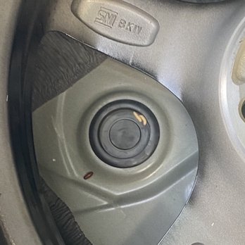 Koeppel Nissan - In the trunk under the tire. - Auto Repair Near Me - Jackson Heights, New York