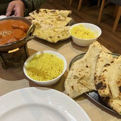 Maharaja - Chicken tilapia masala, rice, garlic, and Peshwari Naan