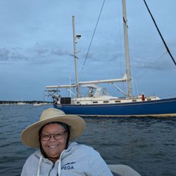 Our Passion Charter Company - Self portrait of me in front of the sailing charter boat Our Passion