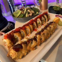 Wasabi Sushi & Izakaya - Seattle Tempura Roll (Bottom) Crunch Roll (Middle) Poke Rice Bowl (Top)