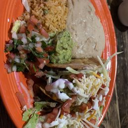 Two beef tacos with beans and rice