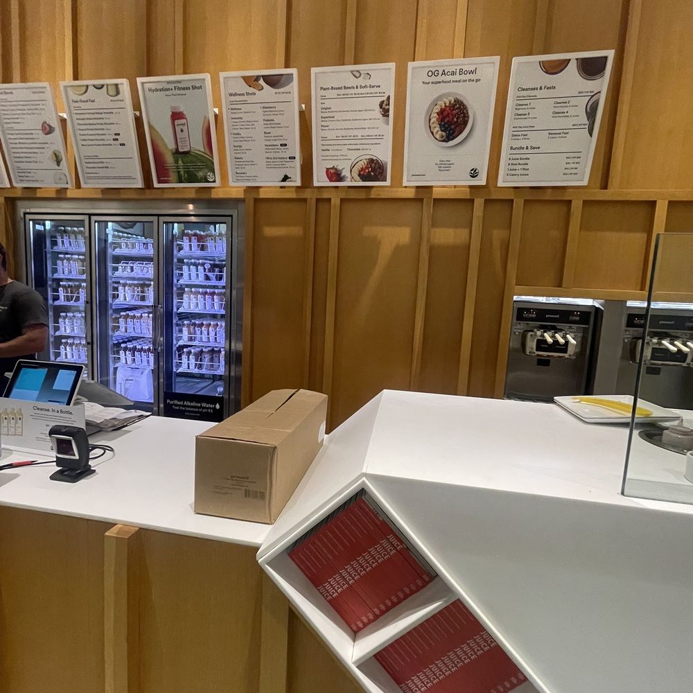 a woman standing at a counter