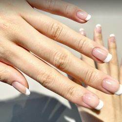 Gel French Manicure by Nancy. Note middle finger's tip.