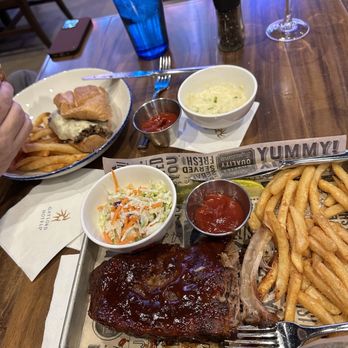 Mountain Pass Sports Bar - Philly steak sandwich and bbq ribs 1/2 rack - Sports Bars Near Me - Aurora, Colorado Mountain Pass Sports Bar - Philly steak sandwich and bbq ribs 1/2 rack - Sports Bars Near Me - Aurora, Colorado