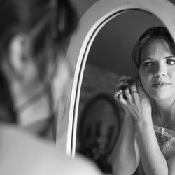 Sandy Roots Photography - Bride preparations in the mirror.