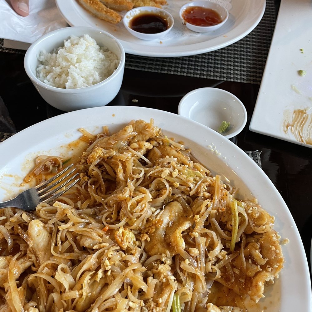 Chicken Pad Thai, Chicken Katsu with a side of rice. Chicken Pad Thai, Chicken Katsu with a side of rice.