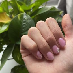 Gel manicure with hand painted flower design Gel manicure with hand painted flower design