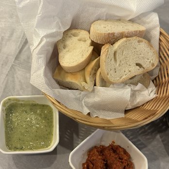 Osteria Mare Blu - Bread Basket (ciabatta and focaccia) with Pesto Sauce - Italian Near Me - Seal Beach, California Osteria Mare Blu - Bread Basket (ciabatta and focaccia) with Pesto Sauce - Italian Near Me - Seal Beach, California
