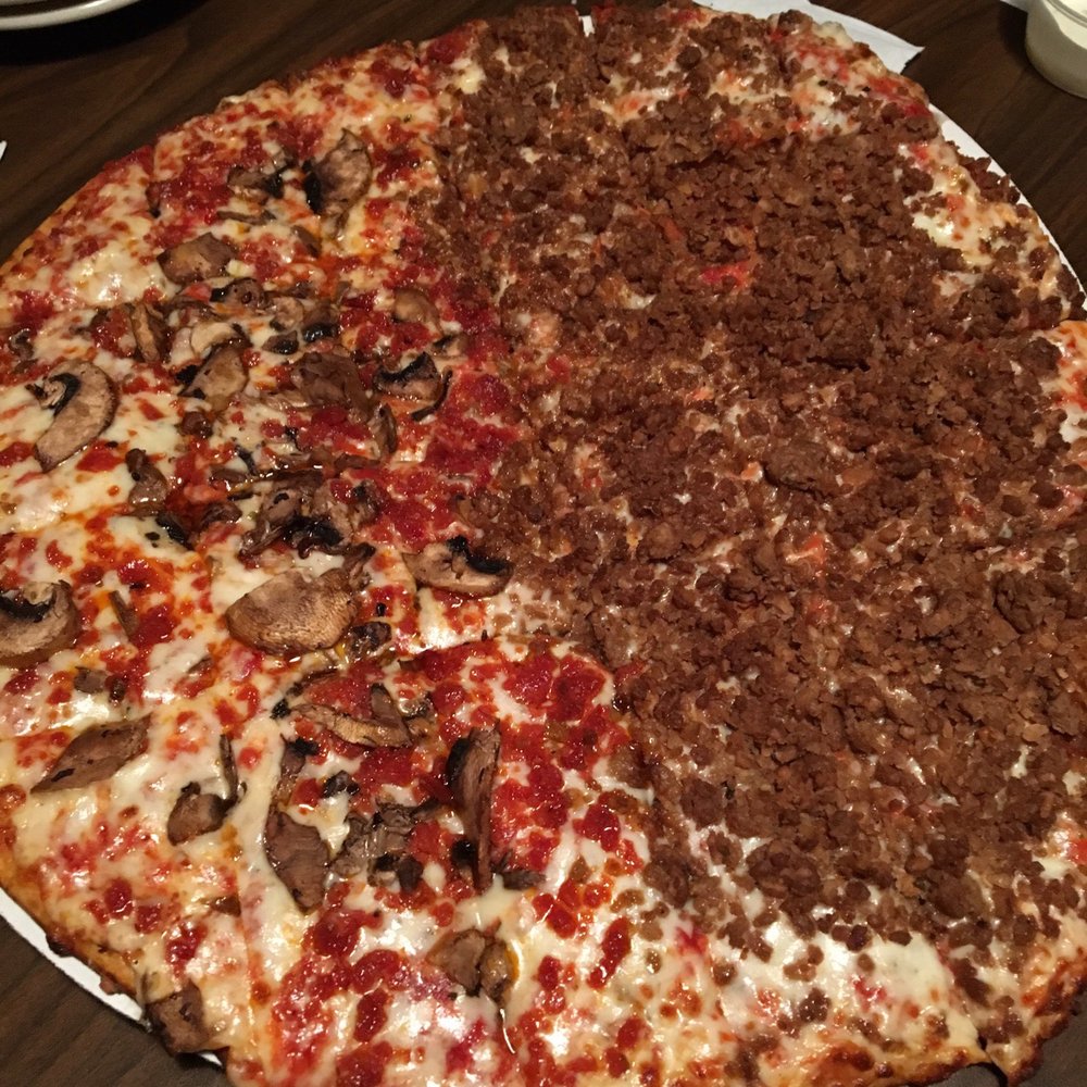 Arni's Restaurant - Half sausage and half mushroom and pepperonis - thin crust yum yum yum - Pizza Near Me - Lafayette, Indiana Arni's Restaurant - Half sausage and half mushroom and pepperonis - thin crust yum yum yum - Pizza Near Me - Lafayette, Indiana