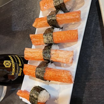 Sushimi's - a plate of sushi and a bottle of beer - Sushi Bars Near Me - Reno, Nevada