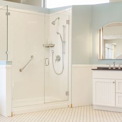 Schicker Luxury Shower Doors, Inc. - A frameless glass shower door maintains a clean, contemporary look for your bathroom.