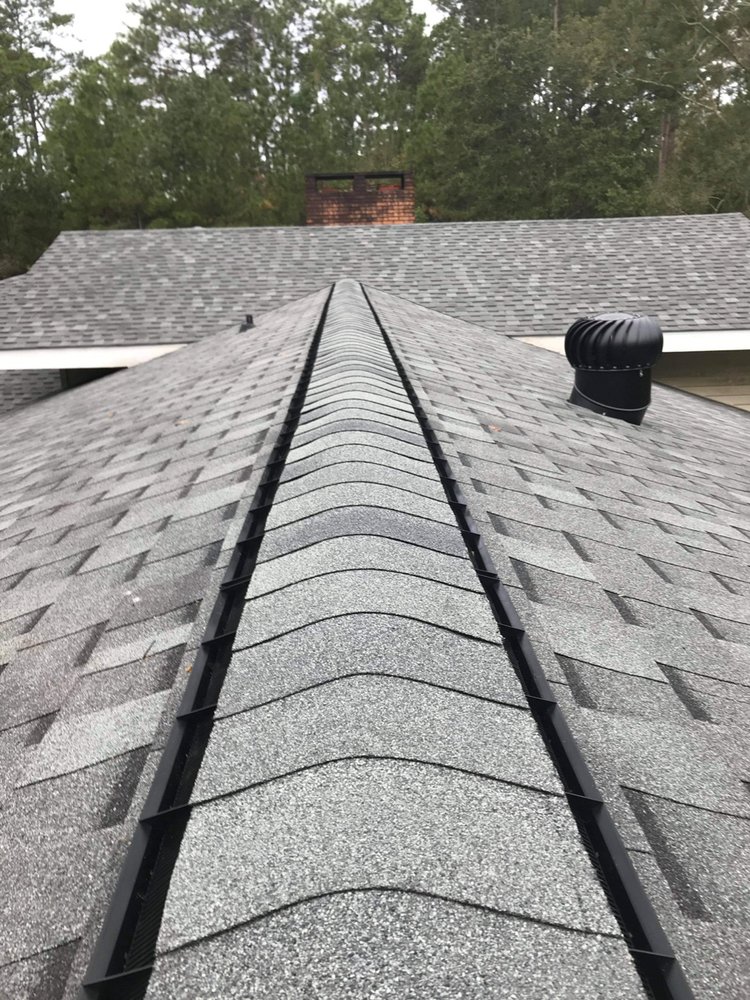 Slide of Spencer Roofing Solutions